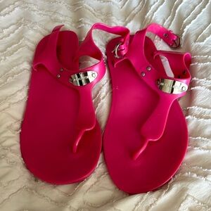 Michael Kors Pink Sandals with Glossy T-Strap Design